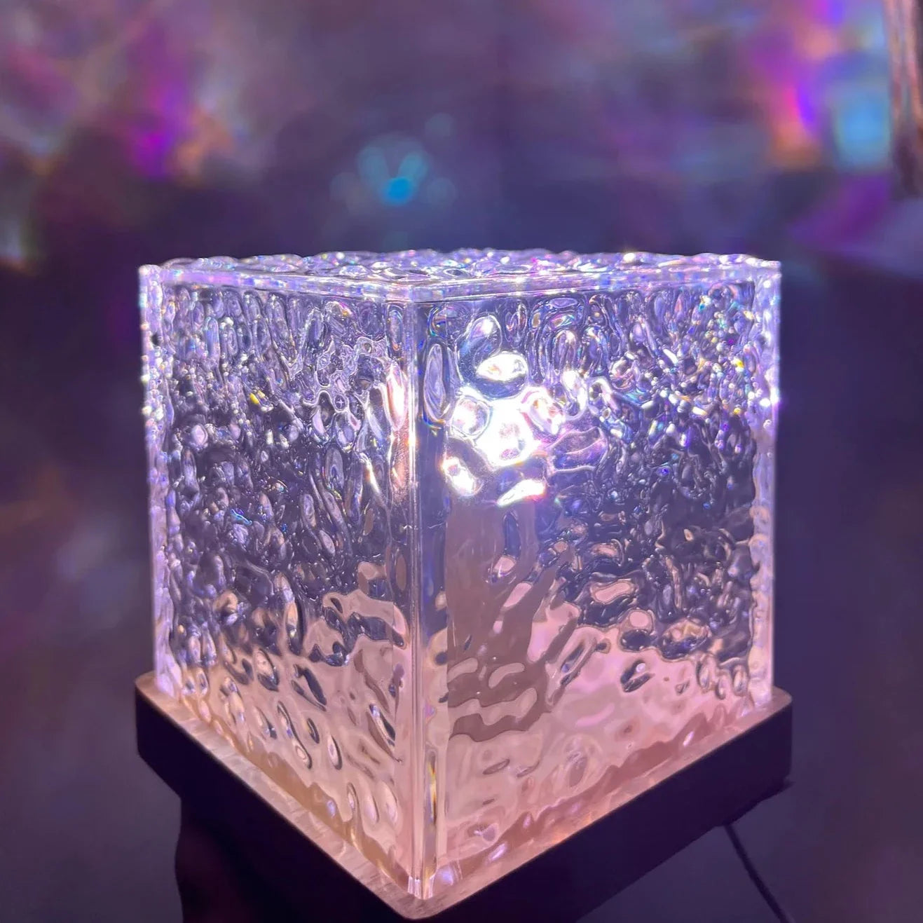 Crystal projection lamp displaying vibrant, dynamic light patterns, creating a calming and colorful ambiance.