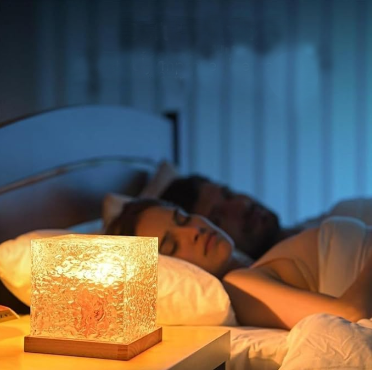 Cube-shaped nightlight emitting a soft, ambient glow, perfect for creating a cozy atmosphere.