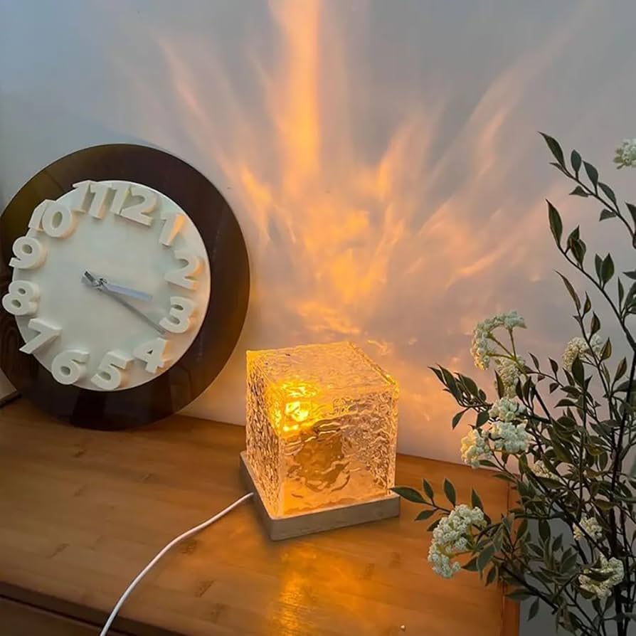 Romantic rotating water ripple night lamp casting serene, wavy light patterns across a room, creating a soothing and dreamy ambiance.