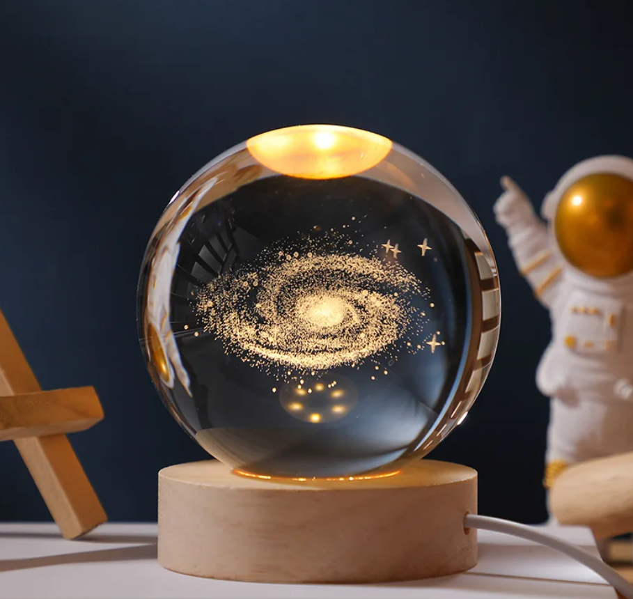 3D Crystal Ball with a Creative Planetary Galaxy design, showcasing a cosmic theme for home décor and ambiance lighting.