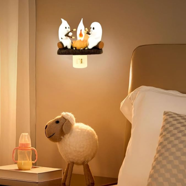 Glowing ghost night lamp with a fun marshmallow roasting scene for cozy nights