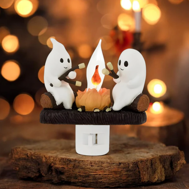 Halloween-themed night light featuring ghosts roasting marshmallows