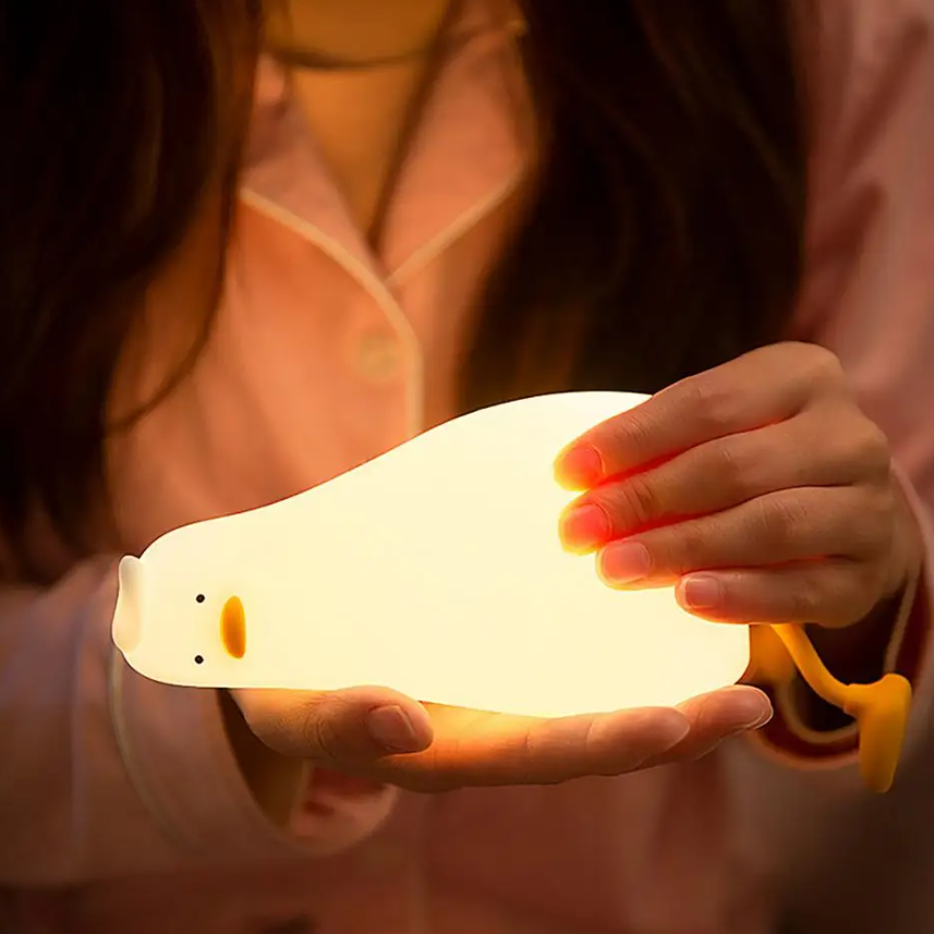 Soft glow lying flat duck night lamp for peaceful sleep